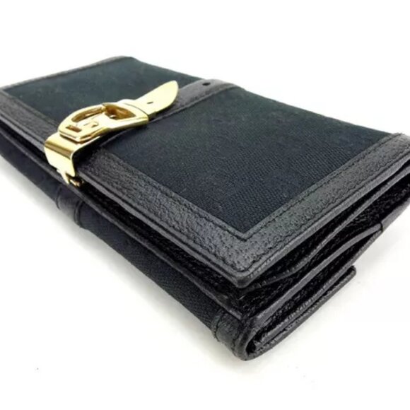 AUTHENTICITY GUARANTEED Gucci Wallet Purse Folding wallet GG Black Gold Woman